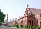 AMU students and teachers distribute clothes as part of centenary celebration