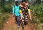 Muslim cop carries two devotees on back for medical aid at Tirumala.